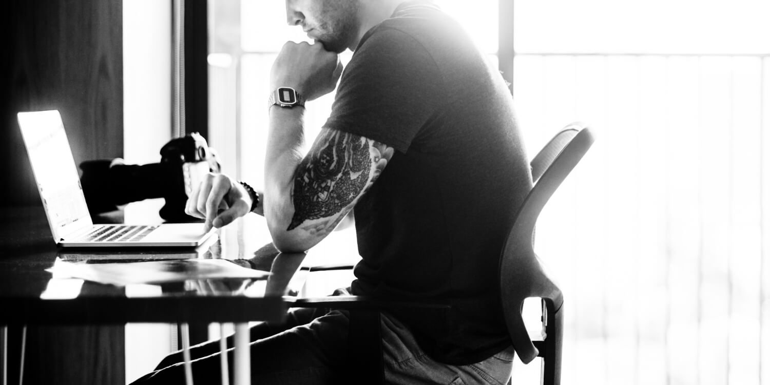 Person thinking at desk